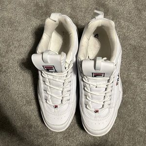 White Fila disrupter shoes without box. Minorly worn. No more than 10 times.